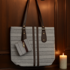 Elegant Beige Textured Handbag with Brown Handles