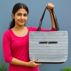 Elegant Beige Textured Handbag with Brown Handles