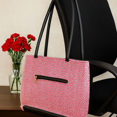 Stylish Pink Chevron Pattern Handbag with Black Accents