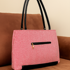 Stylish Pink Chevron Pattern Handbag with Black Accents