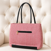 Stylish Pink Chevron Pattern Handbag with Black Accents