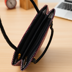 Brown Striped Jute Handbag with Black Handles and Orange Patch