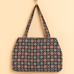 Black Jhola Bag with Multicolor Star Pattern and Orange Patch