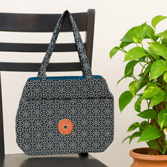 Black Jhola Bag with Geometric White Pattern and Red Patch