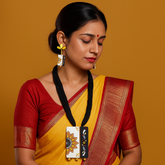 Handcrafted Sunflower Pendant Set – Yellow & Black Tribal Design