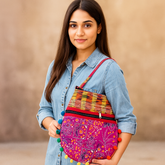 Pink Patchwork Shoulder Bag with Multicolor Handloom Strap & Pom-Pom Border