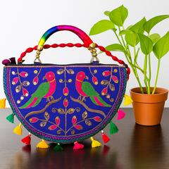 Vibrant Embroidered Sling – Rainbow Strap Parrot Motif Purse
