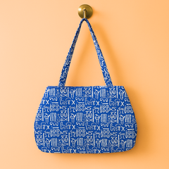 Blue Jhola Bag with Bold White Tribal Print and Red Patch