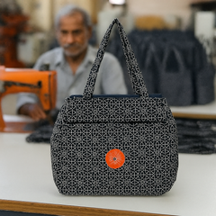 Black Jhola Bag with Geometric White Pattern and Red Patch