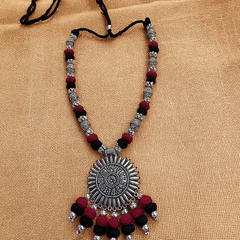 Antique Oxidized Necklace with Sun Pendant – Black & Maroon Thread Work
