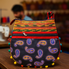 Multicolor Handloom Shoulder Bag with Paisley Design & Pom-Pom Border